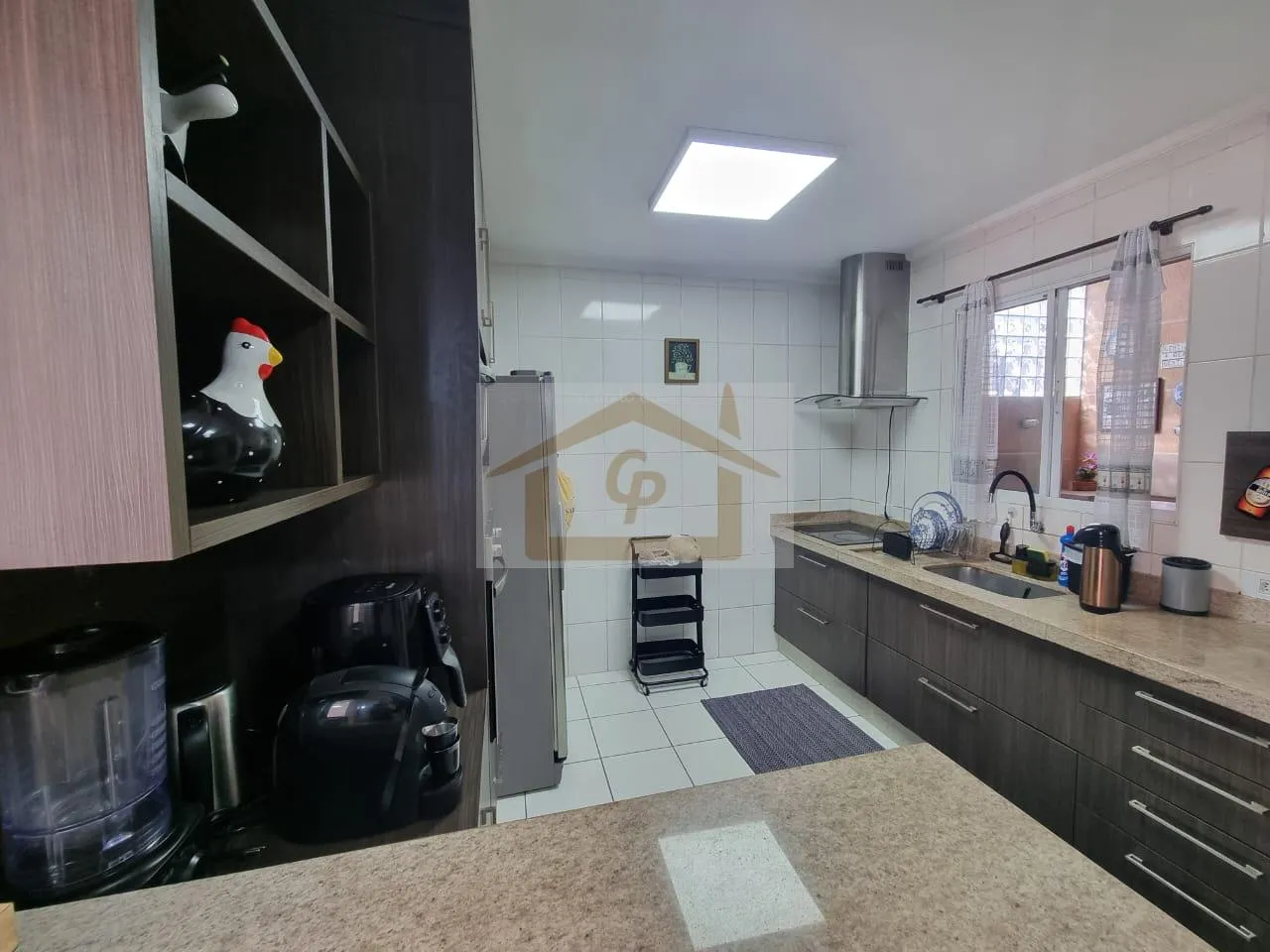 Imagem Bela área Gourmet 3 quartos sendo um suíte, forno de pizza, fogão e churrasqueira, 2 vagas