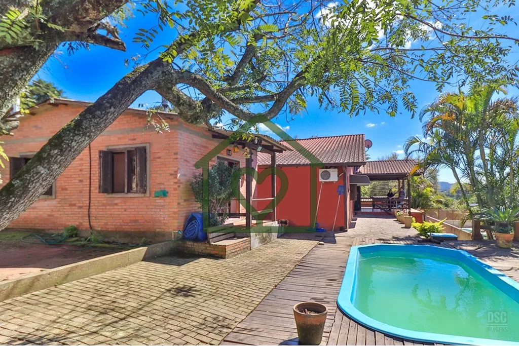 Imagem Casa à venda no bairro Hípica com 165 m2 de área privativa em terreno de 492 m2. O imóvel conta ...