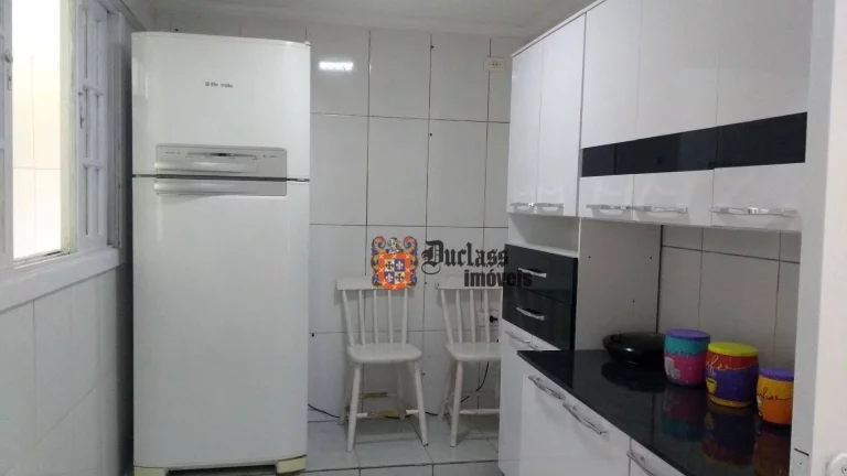 Imagem Sobrado com 2 dormitórios à venda, 180 m² por R$ 590.000,00 - Balneario Praia do Perequê - Guarujá/SP