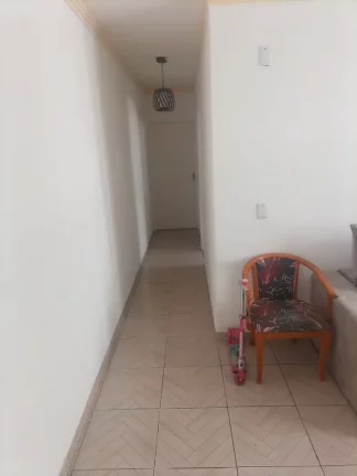 Imagem Apartamento de frente composto de 2 quartos banheiro social uma vaga de garagem na Praia do Morro