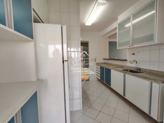 Imagem Apartamento à venda no Jardim Astúrias, Guarujá-SP: 3 quartos, 1 suíte, 2 salas, 2 banheiros, 2 vagas de garagem, 110m².