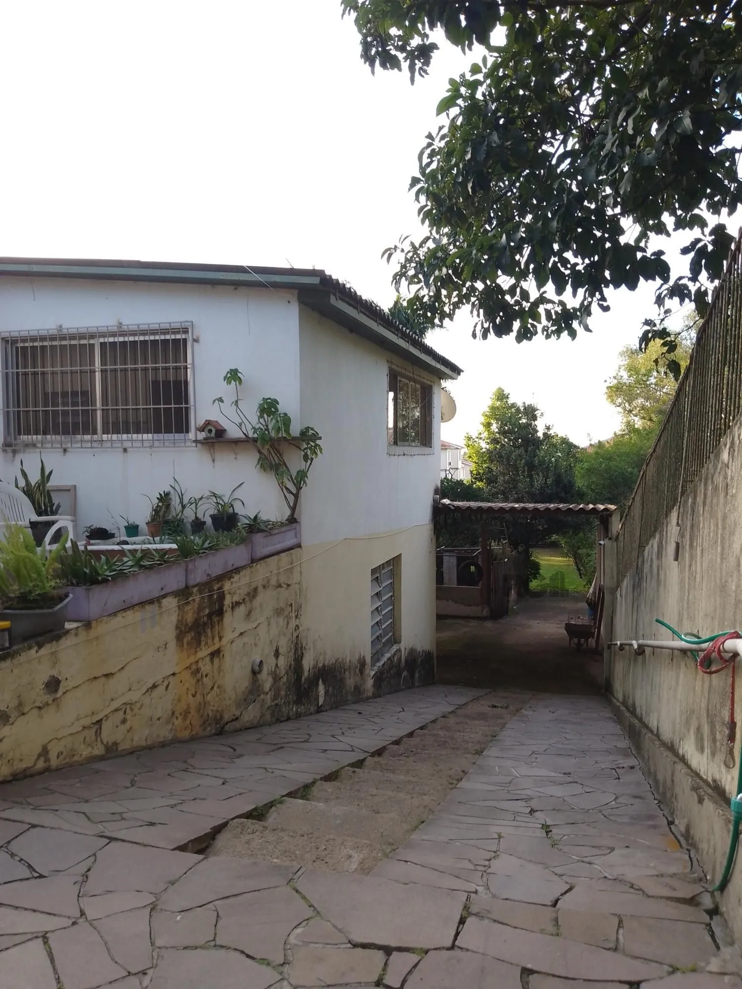 Imagem Casa 4 dormitórios, terreno com 1639m² à venda no Morro Santana