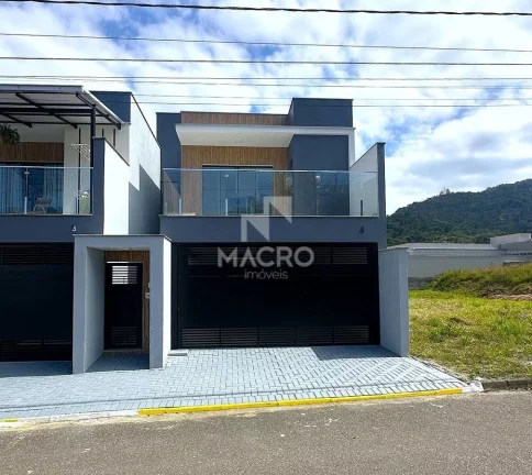 Foto do imóvel Geminado Sobrado | Barra do Rio Cerro | 3 quartos (1 suíte com closet) | 135m²