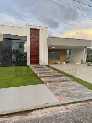 Imagem CASAL IMÓVEIS VENDE CASA TERREA MONTENEGRO BOULEVARD 3 SUÍTES + 6 VGS + PISCINA PRIVATIVA