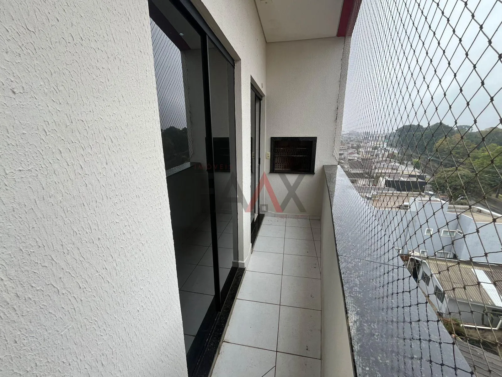Imagem Apartamento Trianon 02 quartos garagem coberta, sacada com churasqueira.