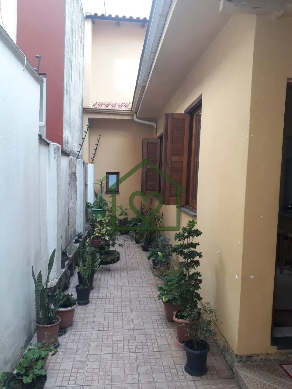 Imagem Ótimo casa/sobrado no bairro Auxiliadora, com 3 dormitórios, 3 vagas de garagem e anexo nos fundos...