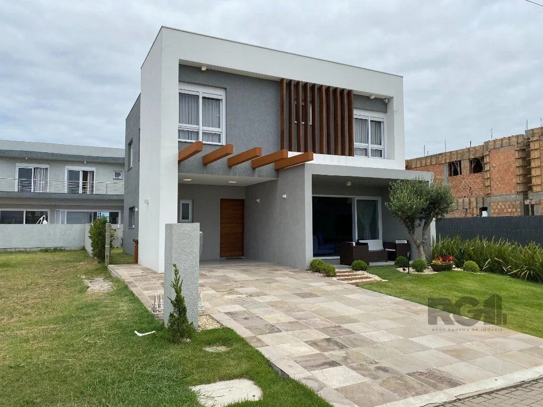 Imagem Casa de Condomínio em Atlântida Sul