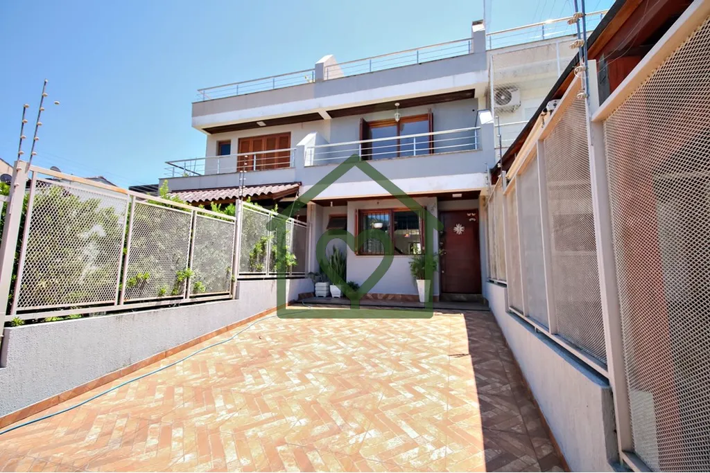 Exclusividade e Sofisticação: Este sobrado de 3 suítes e terraço com vista para o guaíba está ...