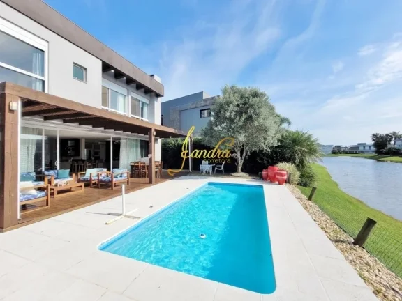 Imagem Casa condomínio com 05 suites e piscina aquecida