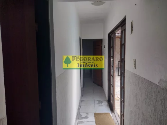 Imagem Casa à venda em Caraguatatuba-SP, bairro Rio do Ouro: 2 quartos, 2 salas, 2 banheiros, 2 vagas de garagem, 127m² - com piscina e churrasqueira!