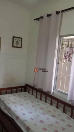Imagem Casa com 2 dormitórios à venda, 64 m² por R$ 390.000 - Vila Caiçara - Praia Grande/SP