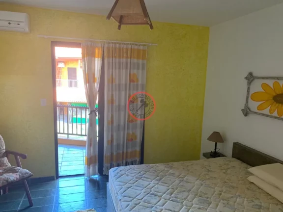 Imagem CASA COM ESCRITURA DEFINITIVA 50 METROS DA PRAIA 2 QUARTOS 2 BANHEIROS 2 VAGAS PISCINA COLETIVA PRONTO PARA MORAR VISTA PARA O MAR