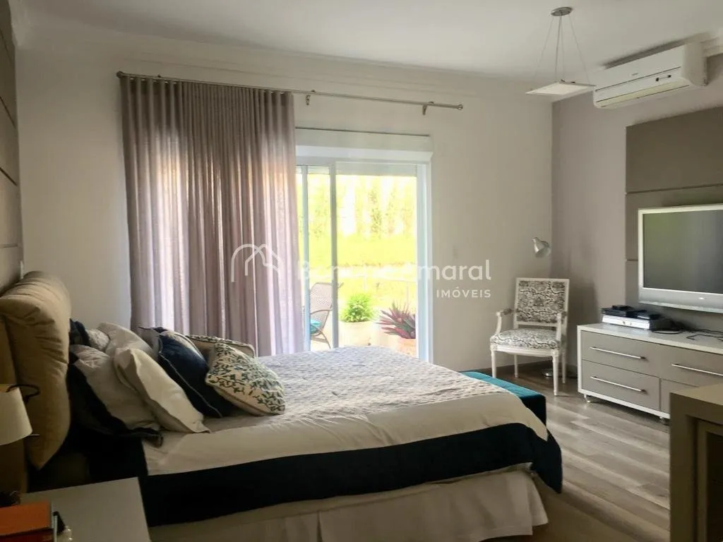 Imagem Casa de condomínio com 520 m² e 4 suítes