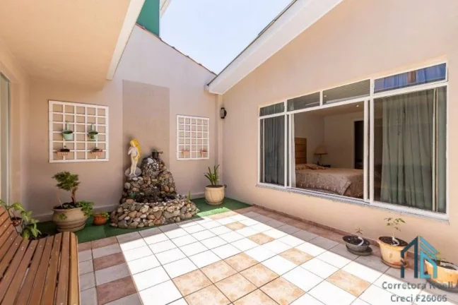 Imagem Casa térrea com área de lazer, 03 quartos sendo 02 suítes, no Santa Cândida em Curitiba PR