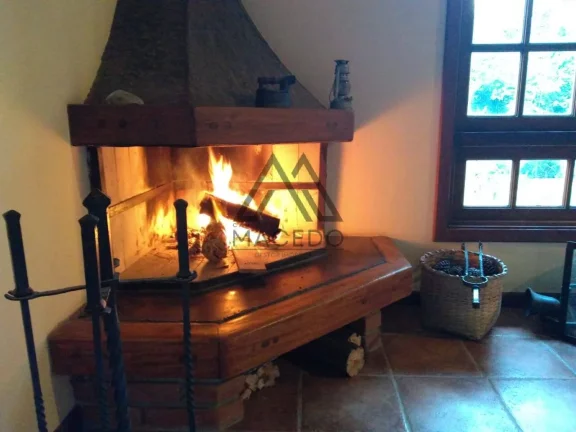 Imagem Casa típica da Granja Viana, em condomínio com mata Atlântica predominante. Propriedade exclusiva...