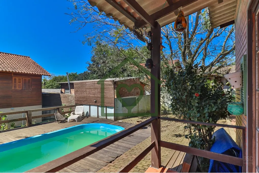 Imagem Casa à venda no bairro Hípica com 165 m2 de área privativa em terreno de 492 m2. O imóvel conta ...