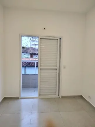 Imagem Sobrado com 2 dormitórios à venda, 62 m² por R$ 395.000 - Aviação - Praia Grande/SP