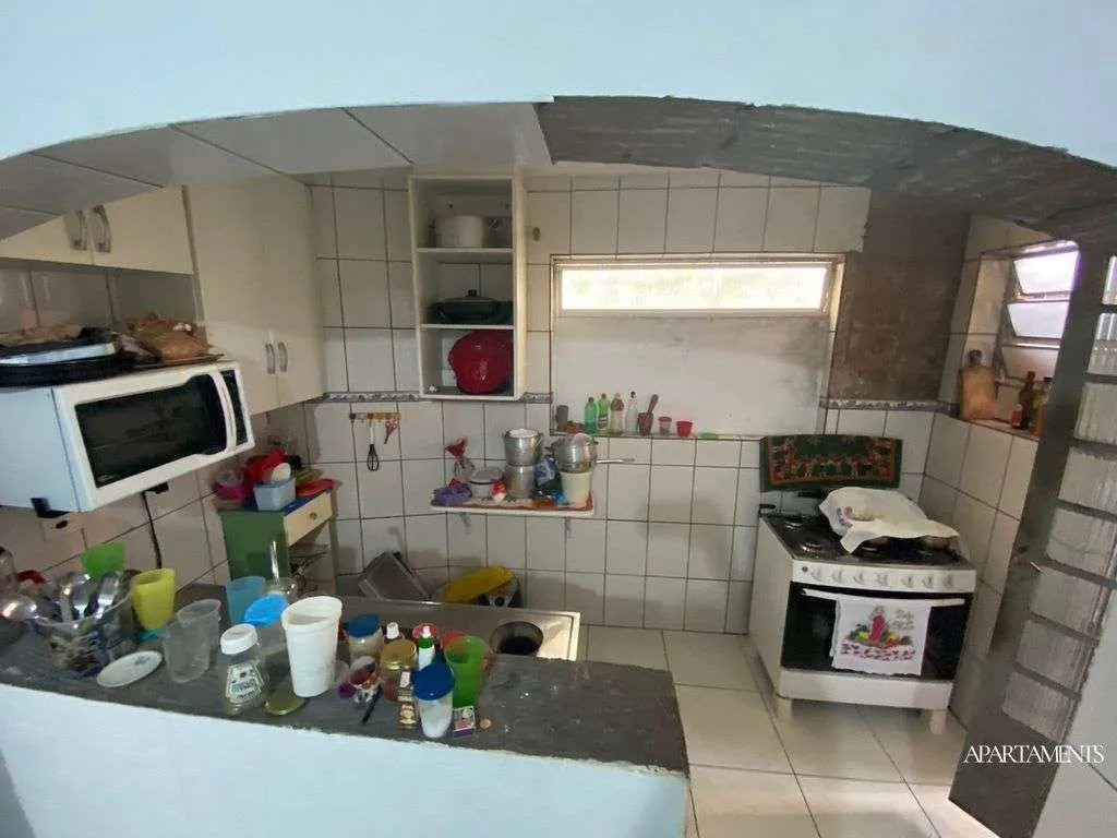Imagem Terreno com 3 Casas com 3 vagas de carro e moto.