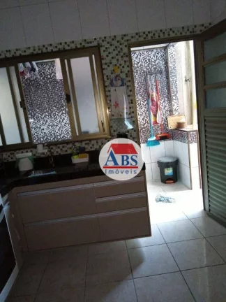 Imagem Sobrado com 3 dormitórios à venda, 208 m² por R$ 410.000,00 - Conjunto Afonso Schmidt - Cubatão/SP