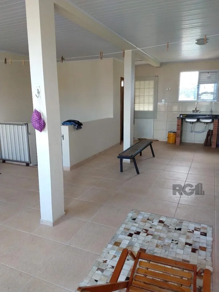 Imagem Casa 3 quartos, 4 vagas, salão de festa, sacada 198m² bairro Rubem Berta, Poa/RS