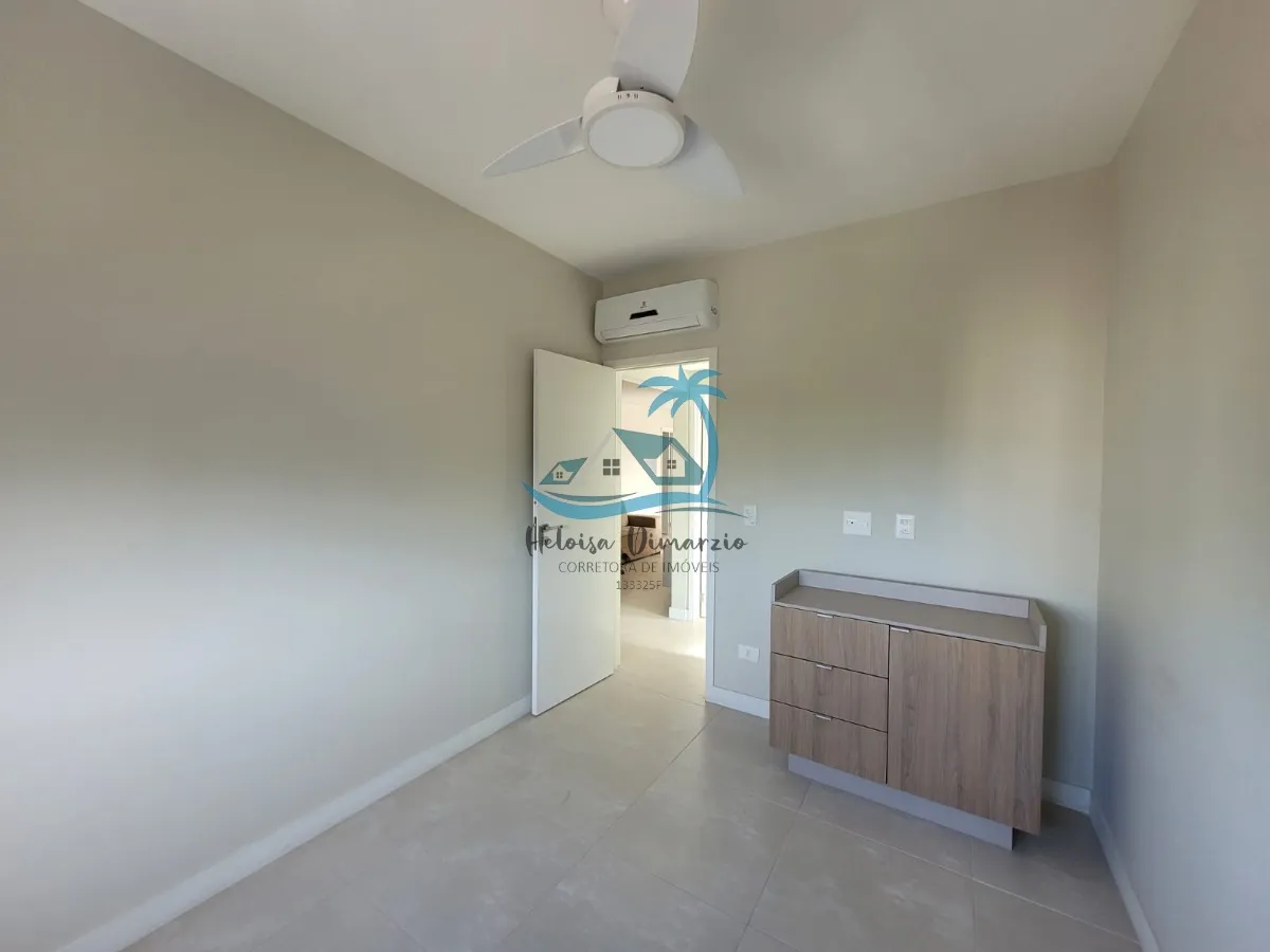 Imagem Excelente Apartamento com 3 dormitórios semi mobiliado e vista para o mar, a venda a 250 metros da orla de Itagua em Ubatuba.