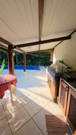 Imagem LINDO SITIO COM 1832 M² COM 2 CASAS PISCINA LINDO GRAMADO ARVORES FRUTIFERAS POÇO ARTESIANNO AREA GORMET PERTO DE TUDO