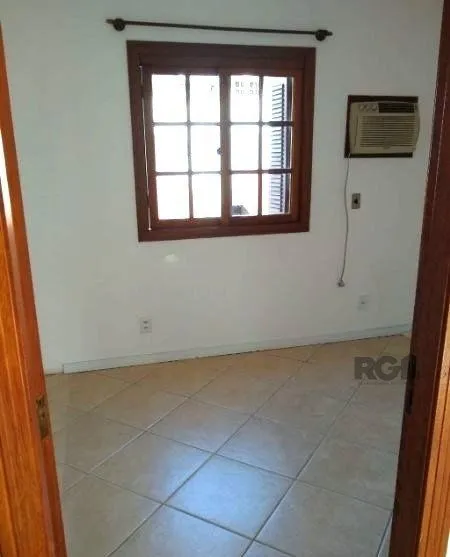 Imagem Casa em condominio no bairro Tristeza de 3 dormitórios e vaga