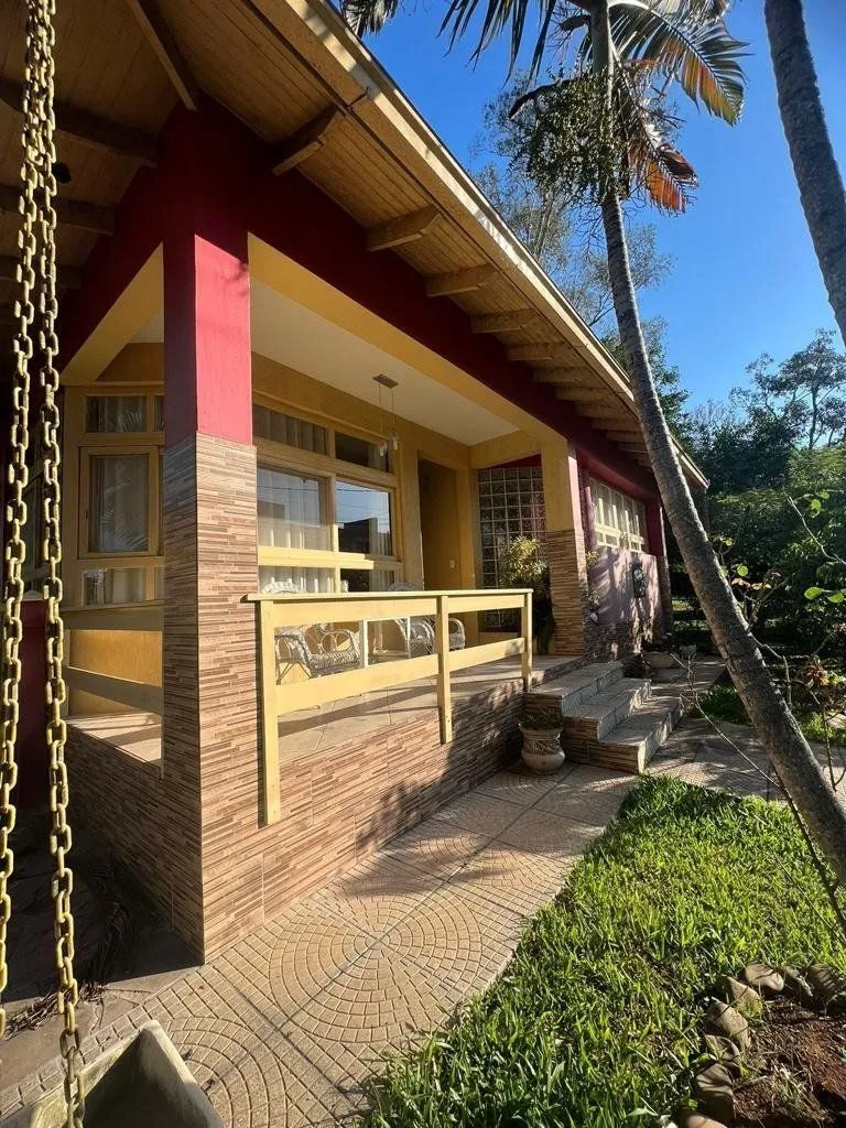 Imagem Casa com 4 quartos, suíte, churrasqueira, vaga de garagem, no bairro Elsa, Viamão/RS