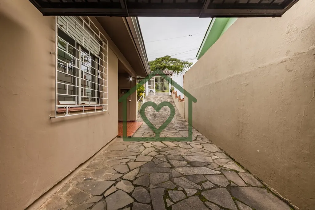 Imagem CASA DE 99m² COM 2 DORMITÓRIOS, 2 BANHEIROS, ESCRITÓRIO, COZINHA, LAVANDERIA, DESPENSA. AMPLO PÁ...