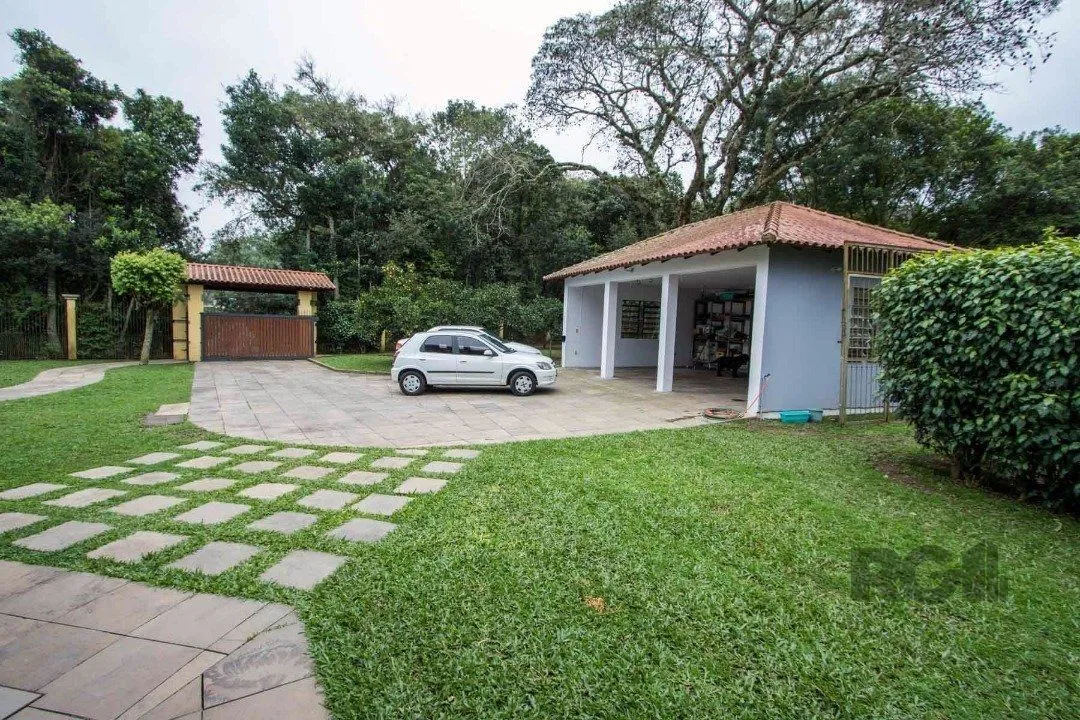 Imagem Sobrado com 6 suites, lareira, lavabo, pátio - Bairro Belém Velho