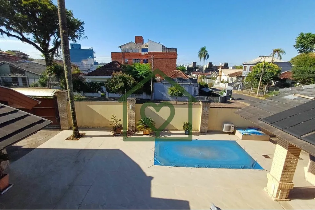 Imagem Desfrute do conforto e sofisticação com esta espetacular casa à venda no bairro Partenon, em Port...