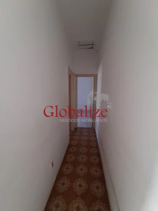 Imagem Casa com 3 dormitórios e 2 vagas à venda no Macuco em Santos R$ 900.000,00