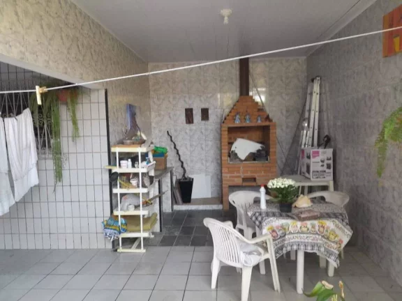 Imagem Sobrado com 3 dormitórios à venda, 199 m² por R$ 1.200.000,00 - Mirim - Praia Grande/SP