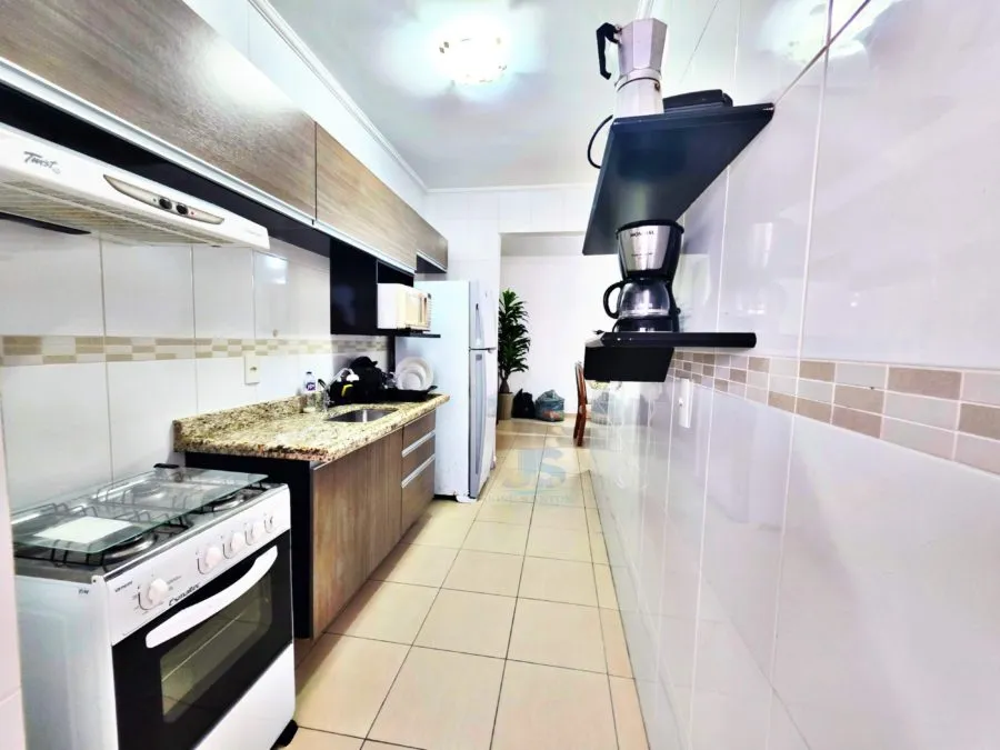 Imagem A VENDA SOFISTICAÇÃO E CONFORTO FRENTE AO MAR COM 90m² | 2 Dormitórios | 2 VAGAS DE GARAGEM COBERTAS + VARANDA GOURMET EQUIPADA.