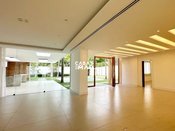 Imagem Imponente residência de luxo com 4 suítes na Barra da Tijúca, Rio de Janeiro - RJ: 3 salas, 6 vagas e 1.000m² de puro requinte!