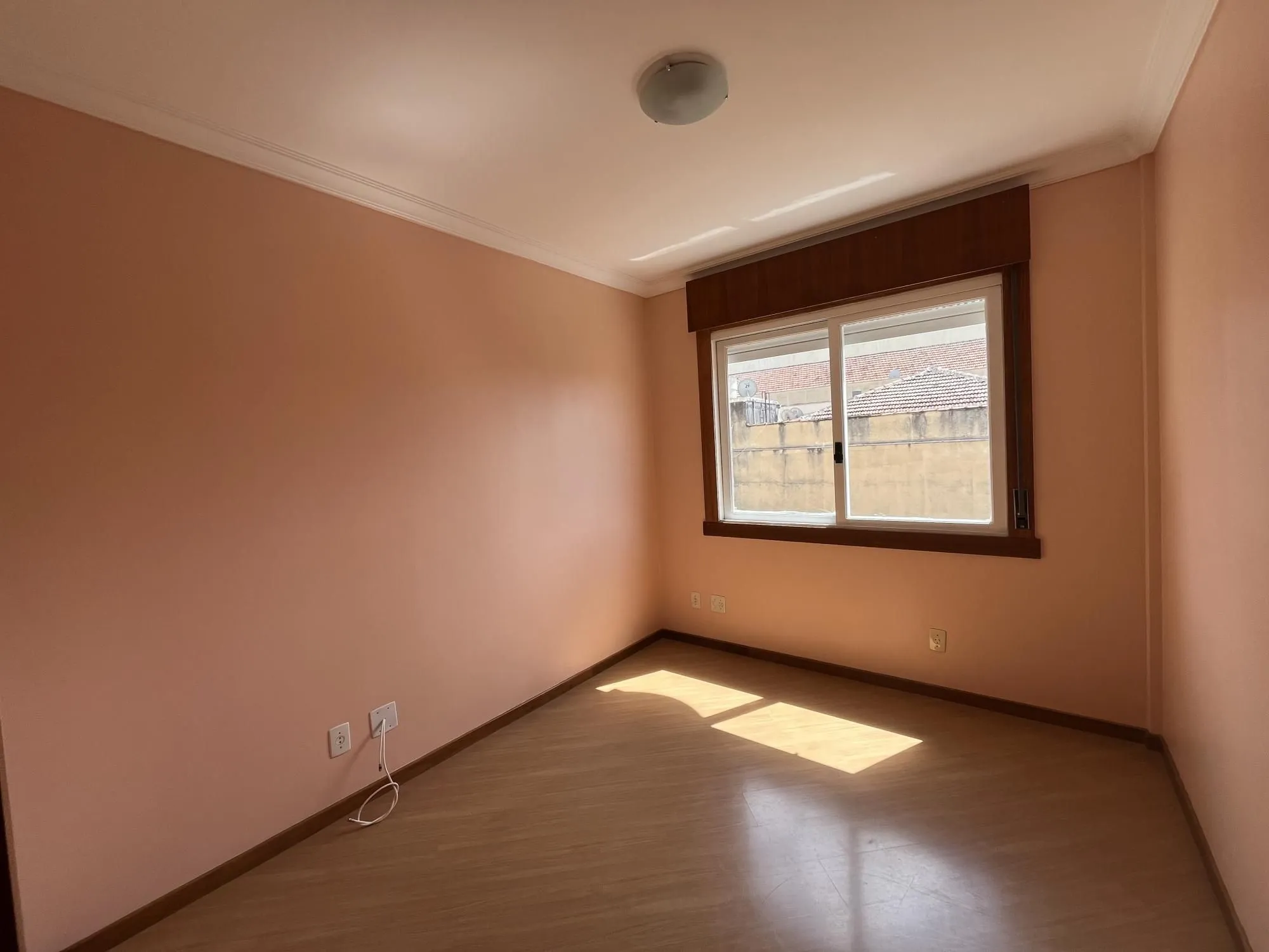 Imagem Apartamento de dois quartos, suíte e uma vaga de garagem no bairro Menino Deus