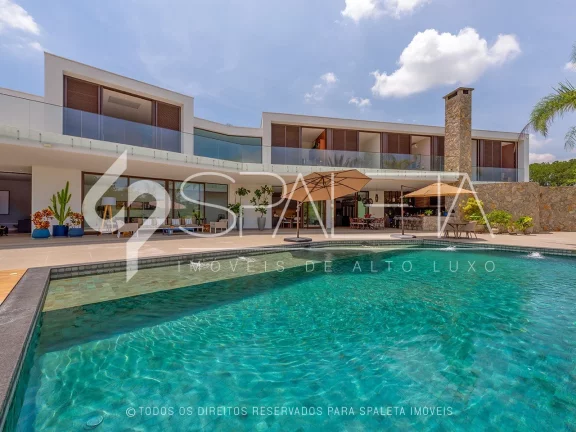 Imagem Casa beira lago e totalmente mobiliada à venda no condomínio Fazenda Vila Real em Itu