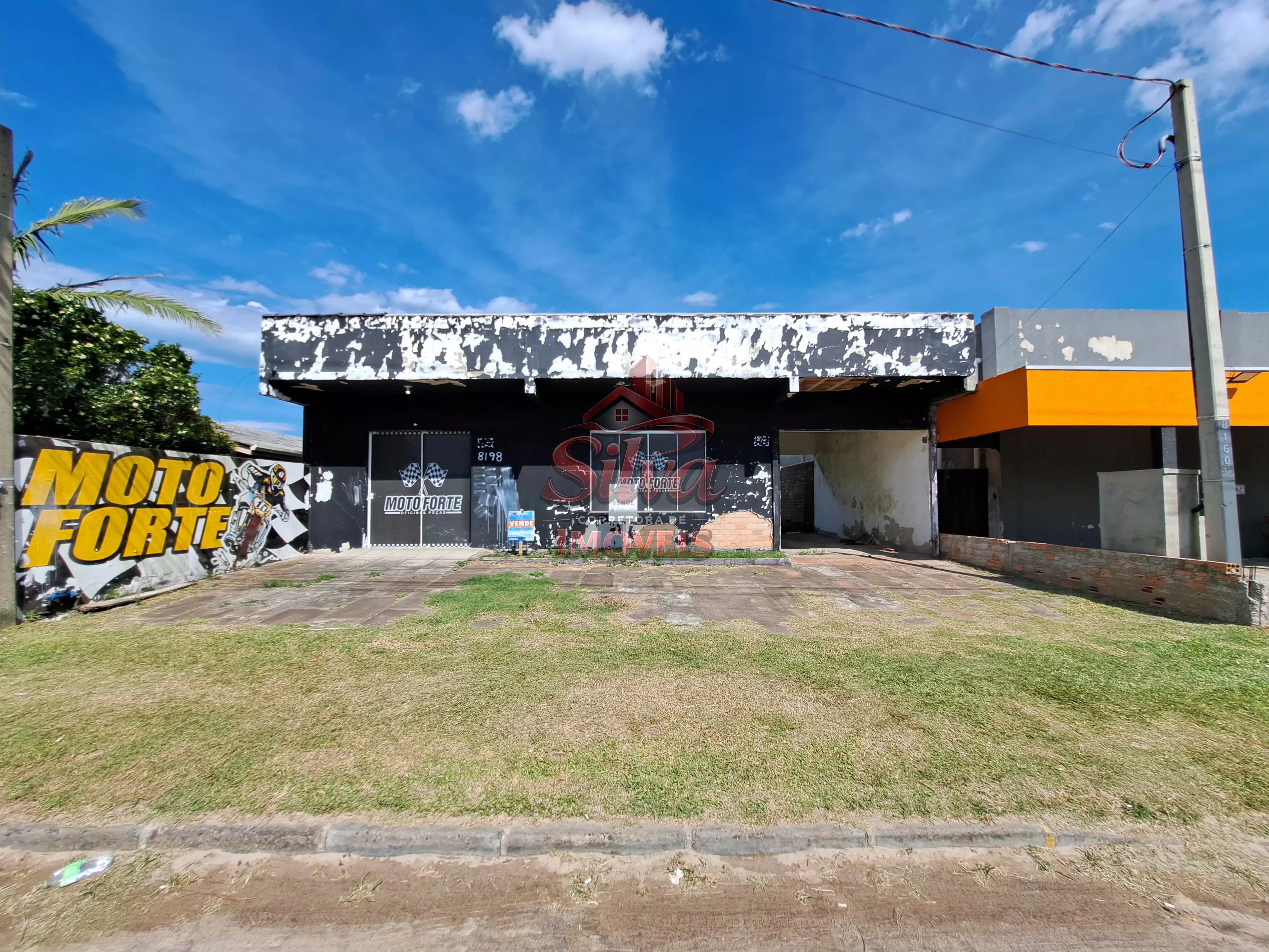 Prédio comercial na avenida principal de Imbé, Mariluz