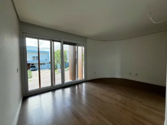 Imagem Casa em Condomínio para venda no bairro Vila Nova em Porto Alegre