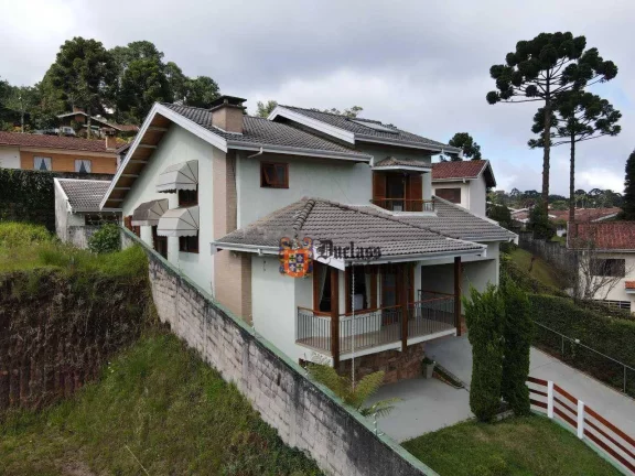 Imagem Casa com 3 dormitórios à venda, 285 m² por R$ 1.250.000,00 - Jardim Toriba - Campos do Jordão/SP