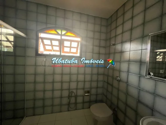 Imagem Sobrado com 03 dormitórios em excelente localização