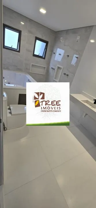 Imagem VENDA DE SOBRADO NOVO NO CONDOMÍNIO REAL PARK, EM ARUJÁ/SP, 300m² com 4 suítes amplas, suíte máster com hidro, área gourmet e piscina. CONSULTE-NOS.
