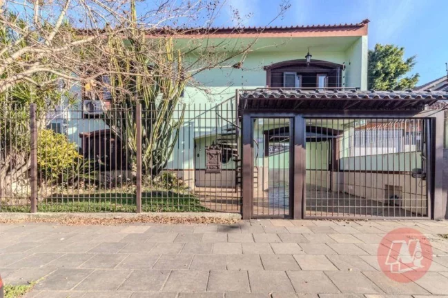 Imagem Casa com 5 dormitórios para alugar, 270 m² por R$ 7.222,00/mês - Partenon - Porto Alegre/RS