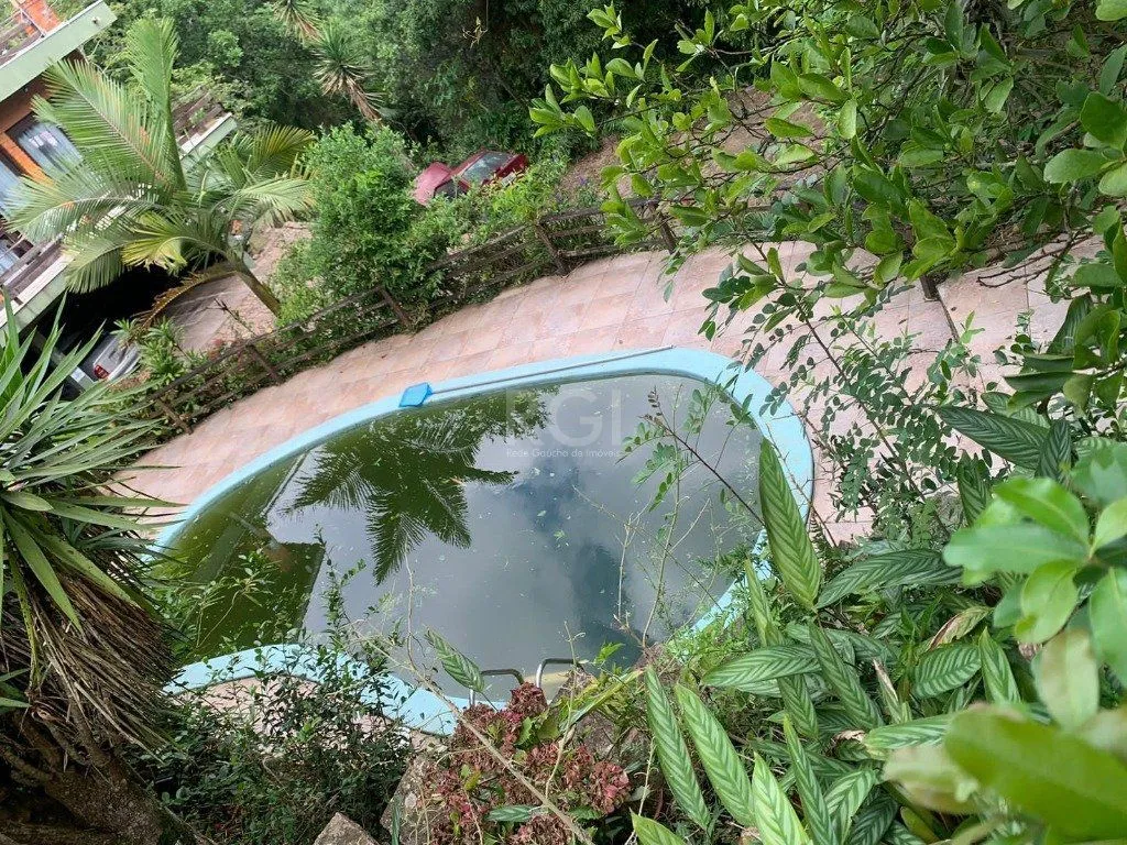 Imagem Terreno de 5.280 m², com 3 casas, no bairro Ponta Grossa, em Porto Alegre.