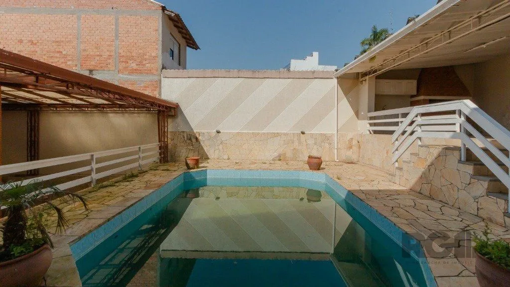 Imagem Casa com 4 dormitórios, 4 vagas no bairro Vila Jardim