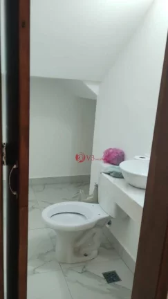 Imagem Sobrado com 3 dormitorios, 2 suites 1 lavabo, 2 vagas para 2 carros, sacadas nos quartos principais, churrasqueira, perto do metro Guilhermina esperaç