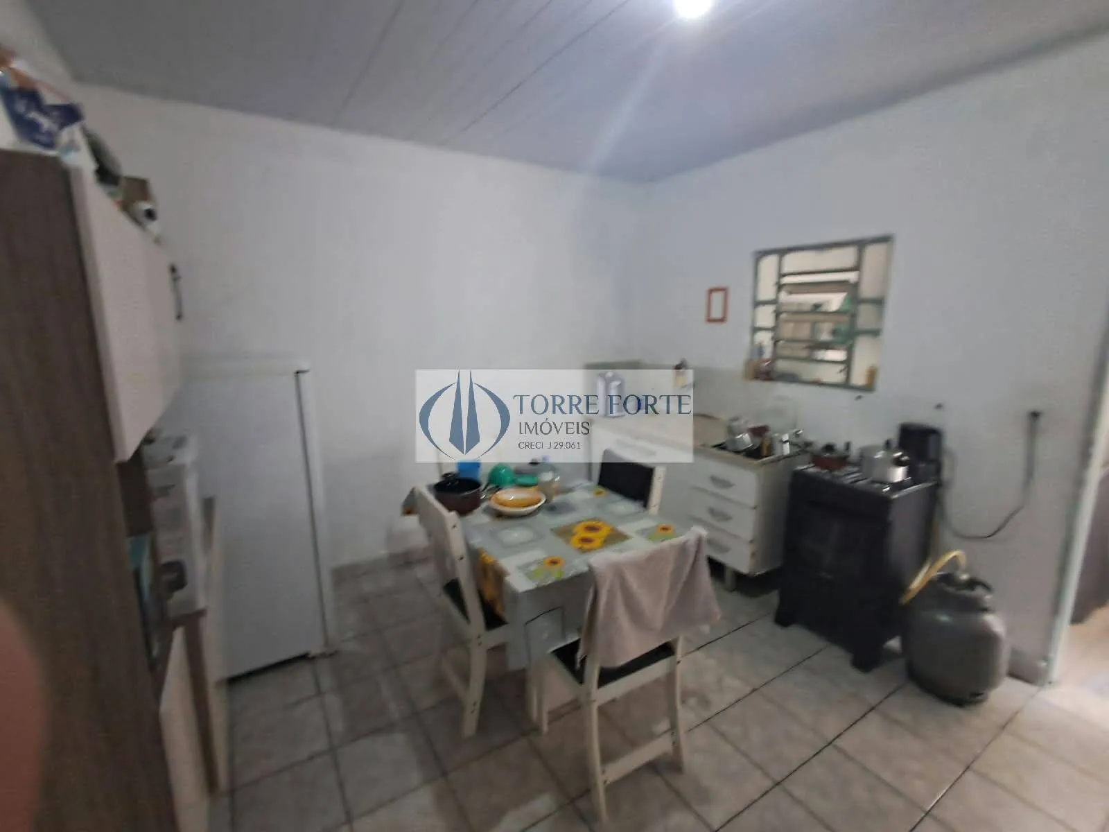 Imagem Terreno com 2 casas