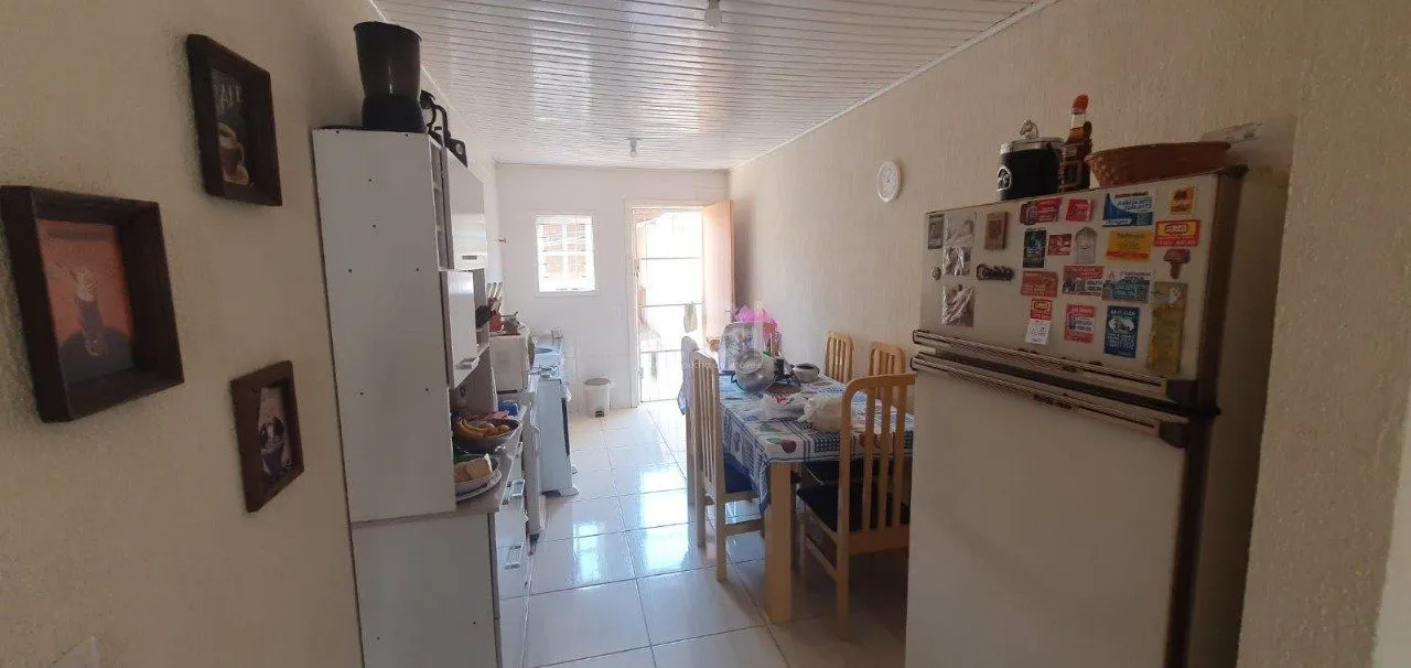 Imagem Casa para Venda - 75m², 2 dormitórios, 1 vaga - Hípica