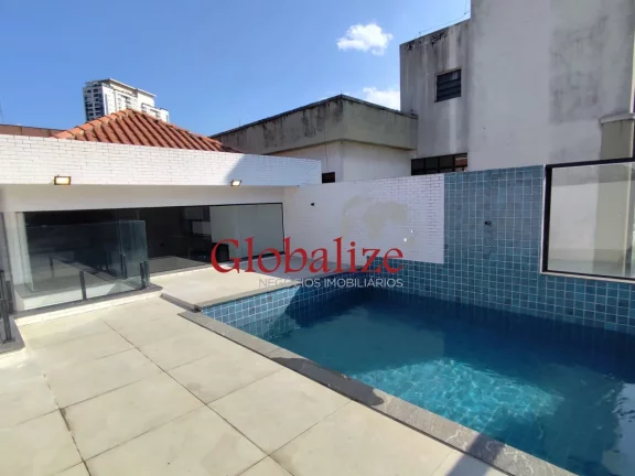 Foto do imóvel Casa sobreposta duplex à venda com 290m², 4 suítes, piscina, churrasqueira por R$1.949.000,00 no Boqueirão em Santos