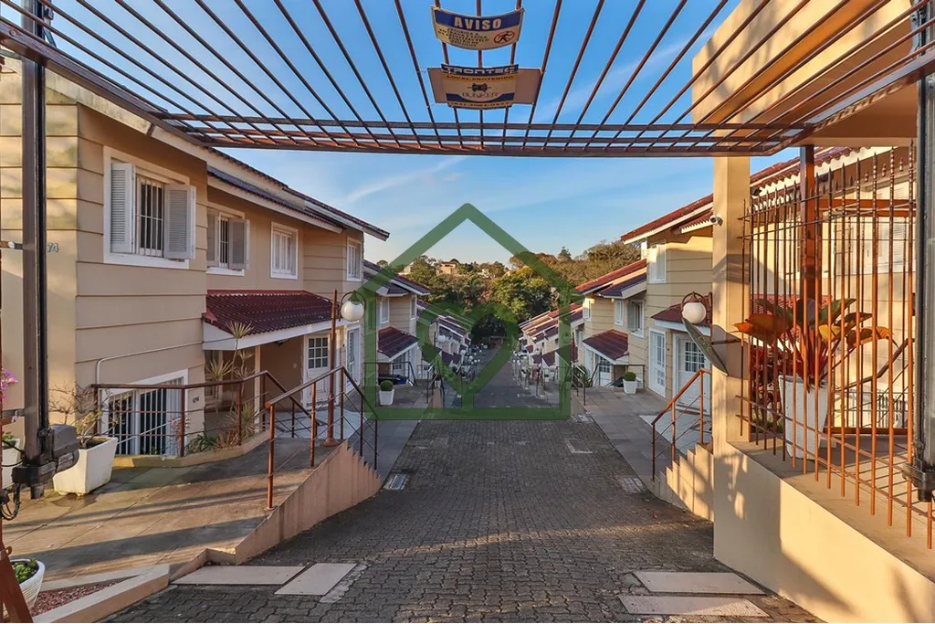 Imagem Casa em condomínio no bairro Nonoai, com 122m² privativos distribuídos em 2 andares. No térreo, ...